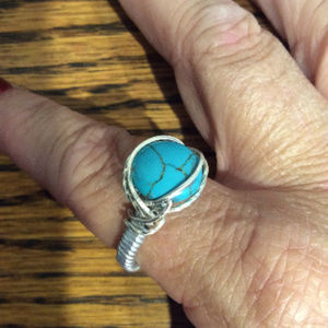 Turquoise and silver wire wrapped ring